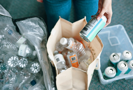 person sorting cans and bottles